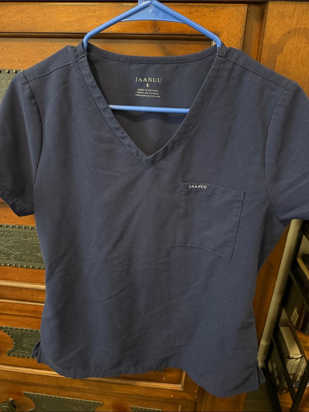 Jaanuu Navy V-Neck Scrub Top and joggers